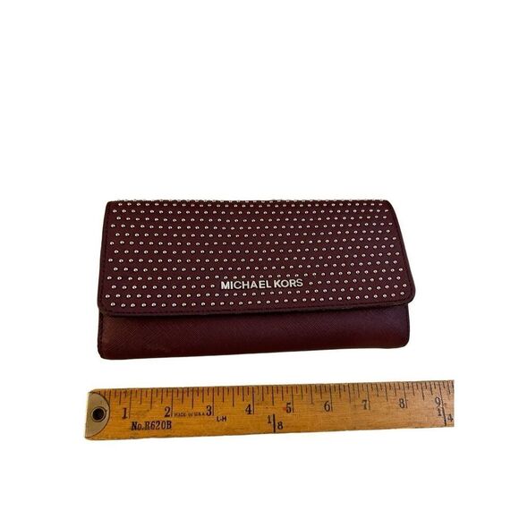 Michael Kors burgundy walker faux leather studs 8x4” - Picture 1 of 7